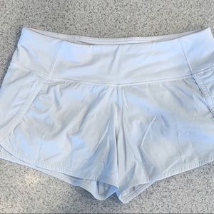 White Lululemon running shorts 4” size 6
